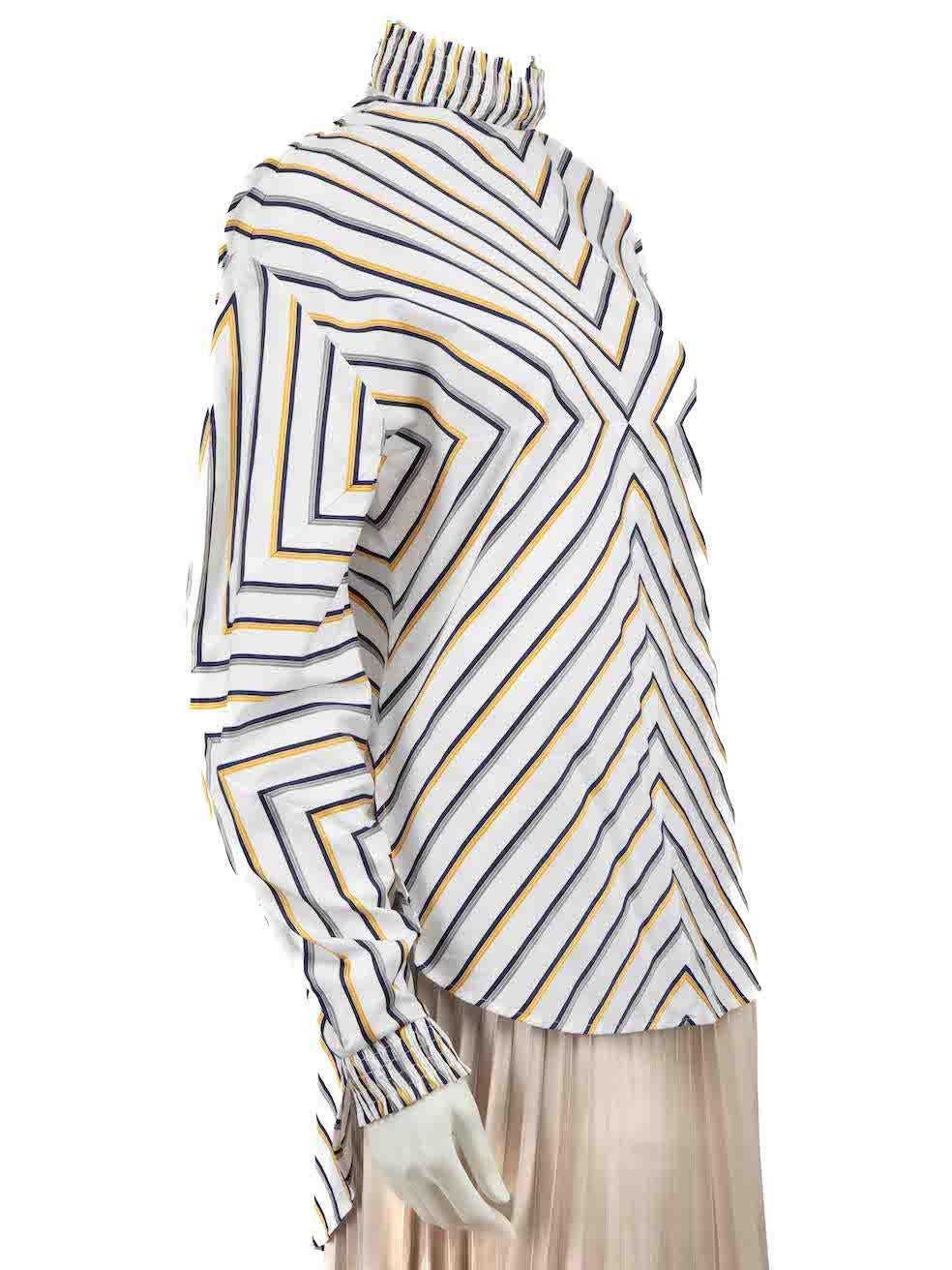 CONDITION is Very good. Minimal wear to shirt is evident. Minimal wear to the left sleeve cuff with light mark on this used Silvia Tcherassi designer resale item.
 
 Details
 White
 Cotton
 Long sleeves blouse
 Striped pattern
 Mock neckline

