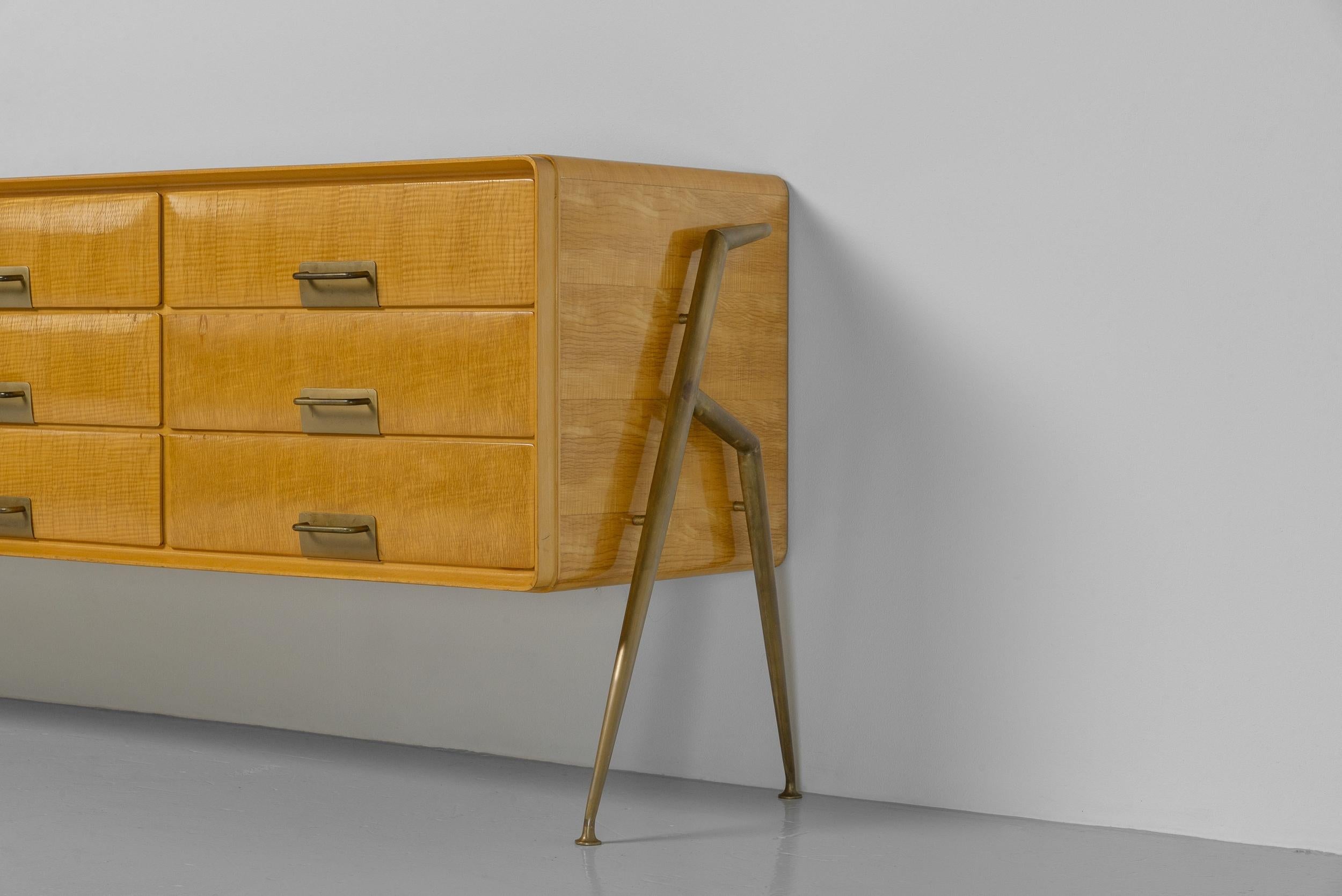 Rare drawer cabinet created by the renowned furniture designer Silvio Cavatorta in Italy 1958. Unlike the commonly seen six-drawer version with a mirror, this exceptional piece features nine drawers, making it truly unique. The cabinet is made from