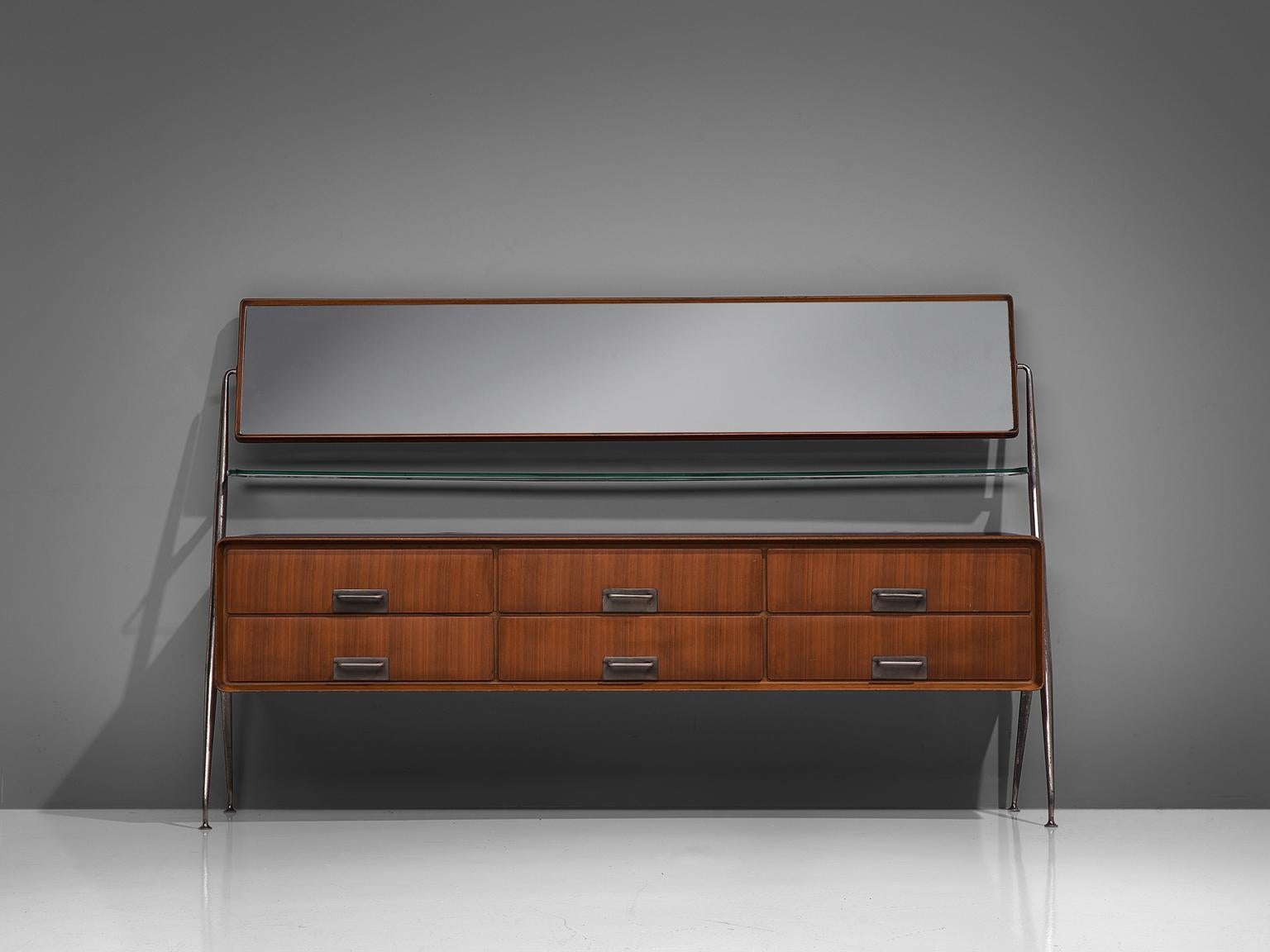Silvio Cavatorta, sideboard, metal, mahogany and glass, Italy, 1958.

Elegant and rare Italian sideboard by Silvio Cavatorta. This cabinet is equipped with six drawers, a glass shelf and a pivoting mirror with a spanning of 180 cm. The mahogany