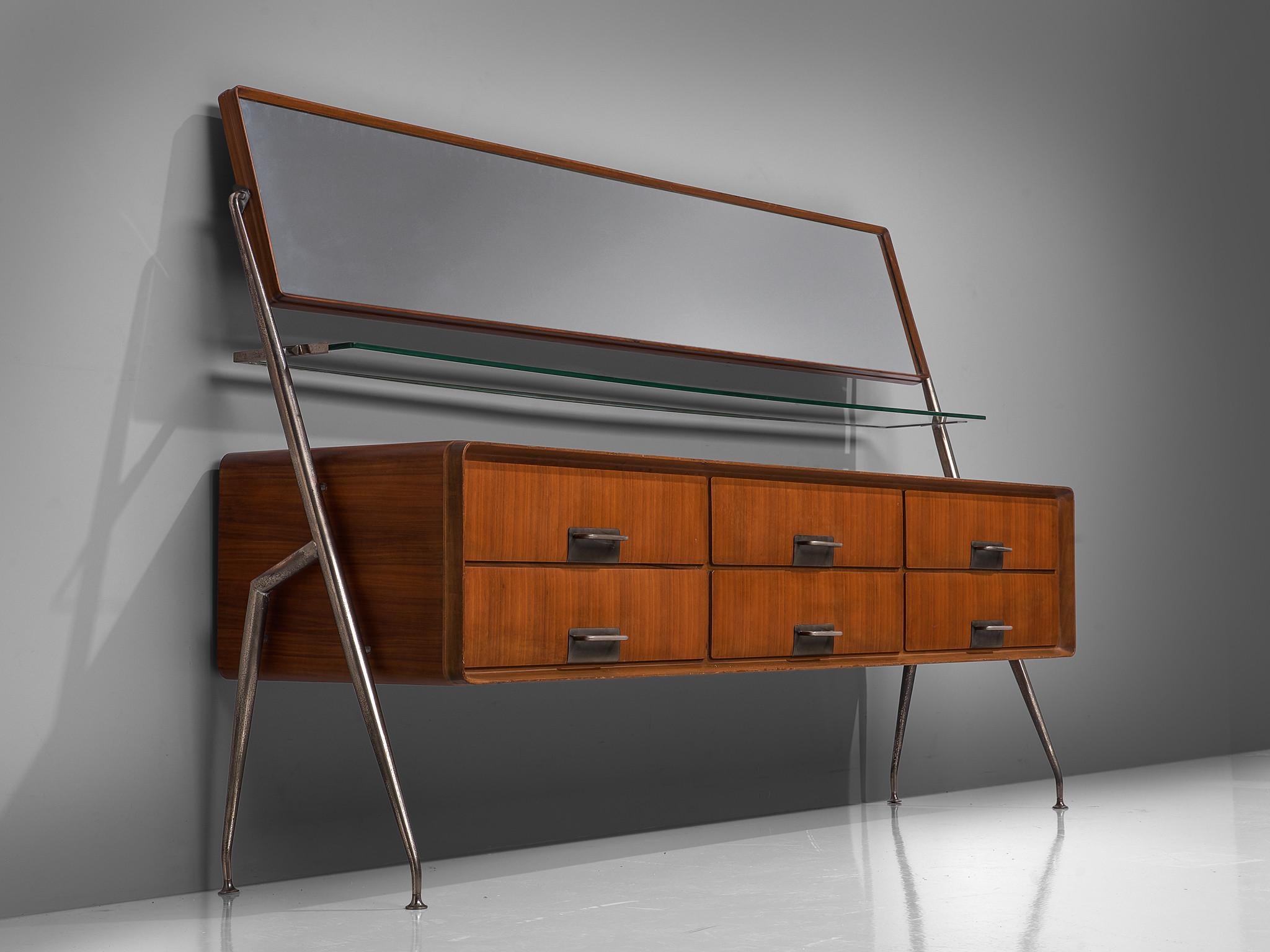 Silvio Cavatorta, sideboard, metal, mahogany and glass, Italy, 1958.

Elegant and rare Italian sideboard by Silvio Cavatorta. This cabinet is equipped with six drawers, a glass shelf and a pivoting mirror with a spanning of 180 cm. The mahogany case
