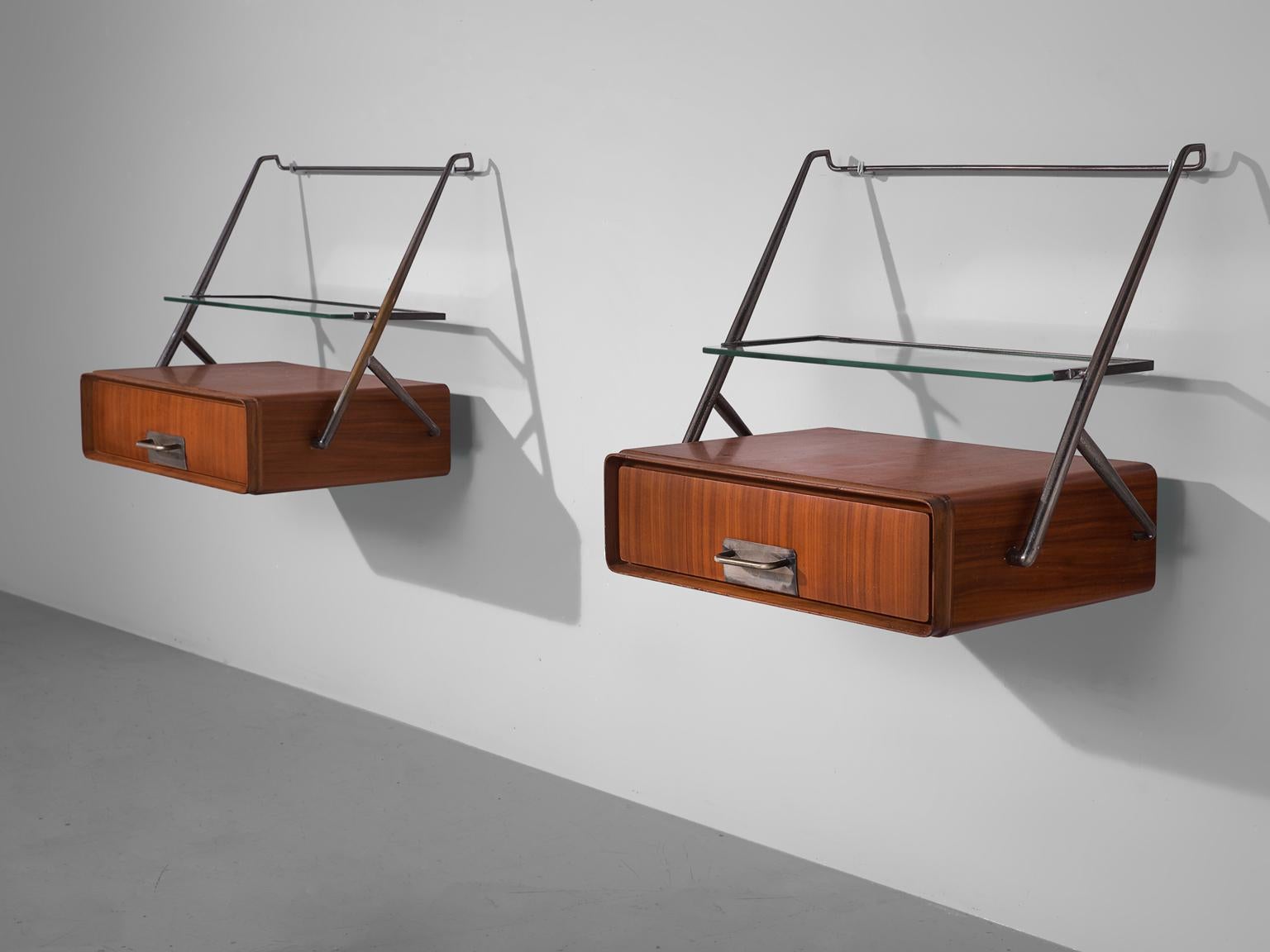 Night stands by Silvio Cavatorta, maple, brass, glass, Italy, 1950s.

These two delicate bedside tables are designed by the Italian Silvio Cavatorta. The little cabinets feature one door in each maple compartment and on top a brass frame with a