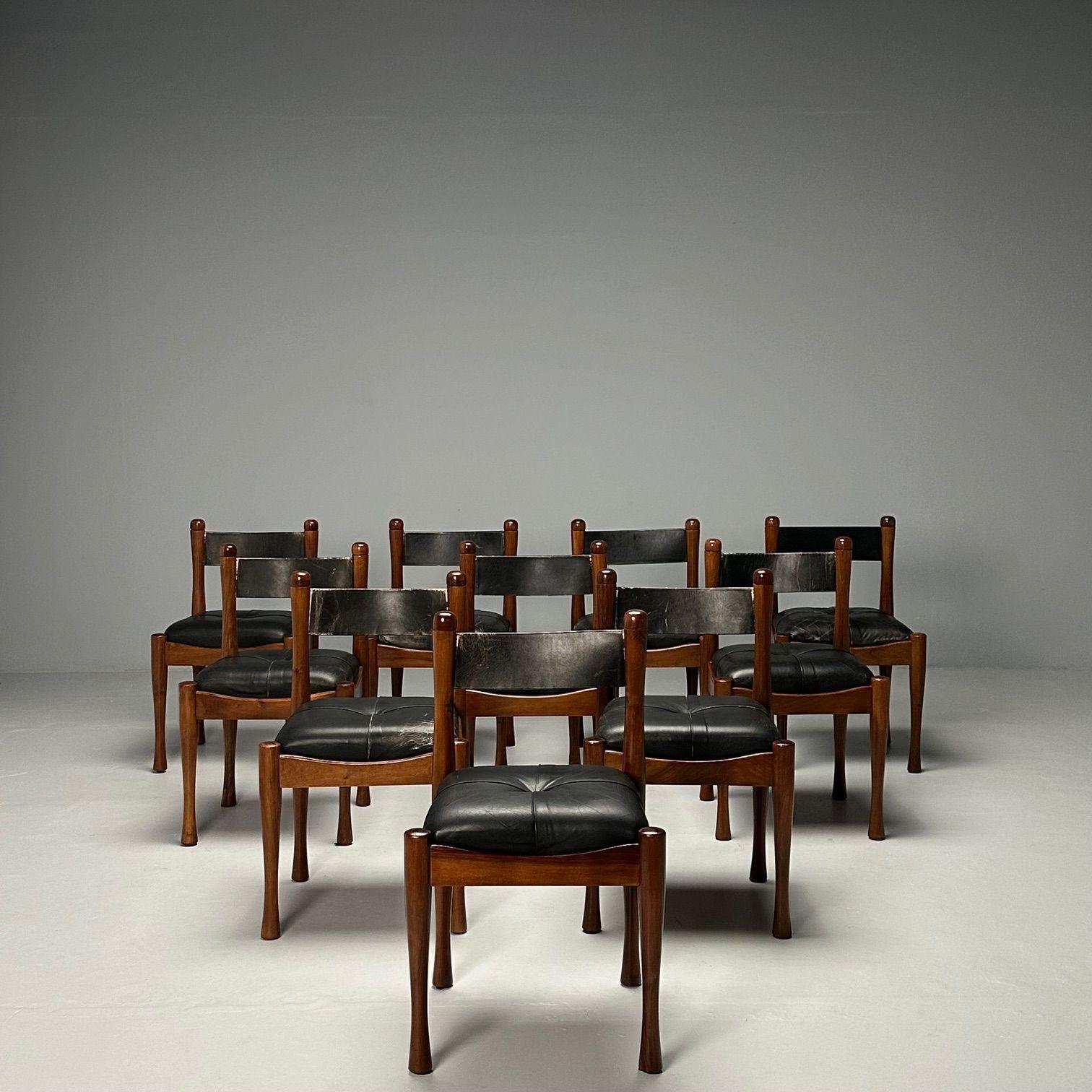 Silvio Coppola, Bernini, Italian Mid-Century Modern, Dining Chairs, Walnut, 1960s

Set of ten (10) dining chairs designed by Silvio Coppola for Bernini circa 1960s. Each example has strong walnut modernist frames with distressed black leather