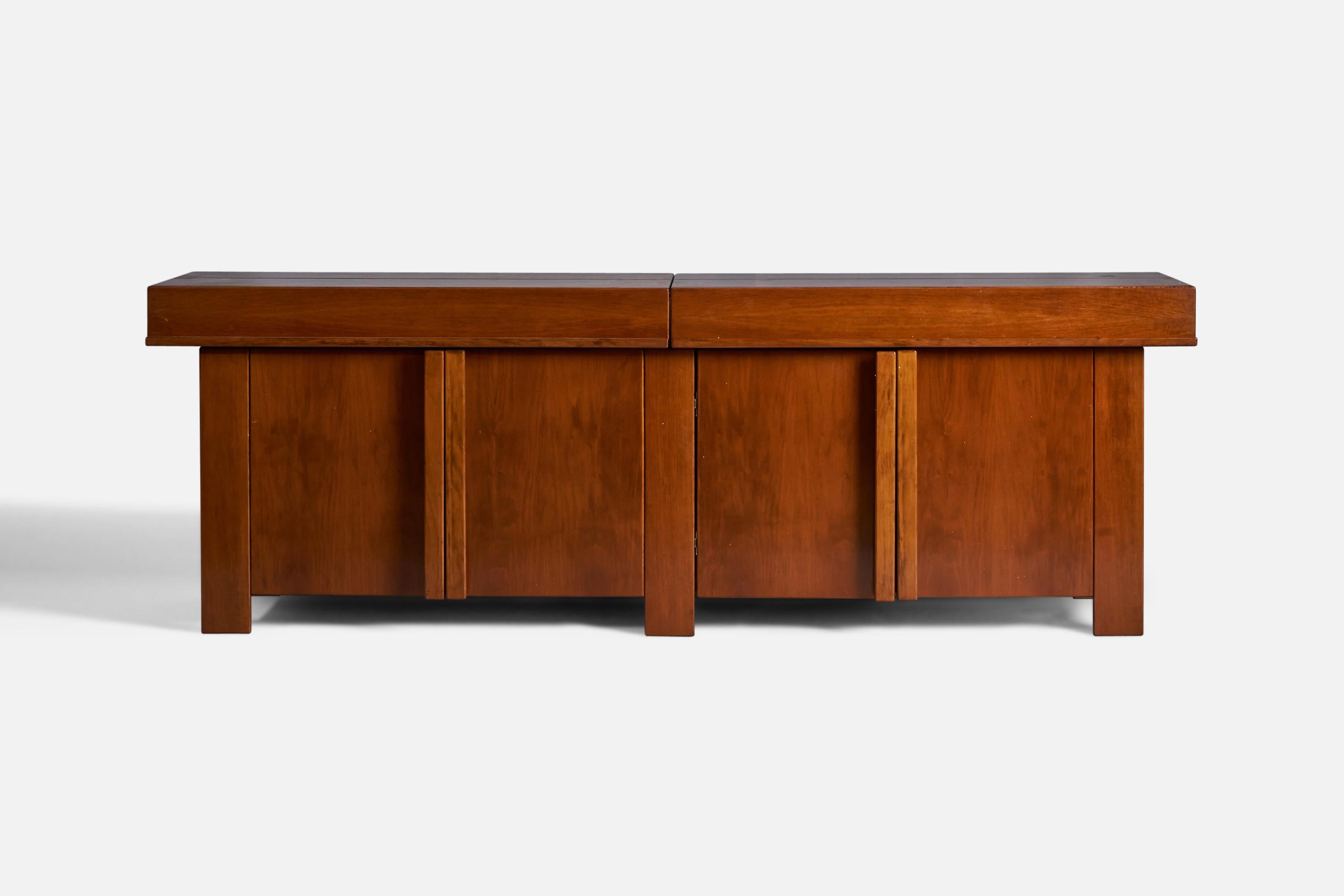 A sizeable walnut cabinet or sideboard, designed by Silvio Coppola and produced by Bernini, Italy, 1960s.