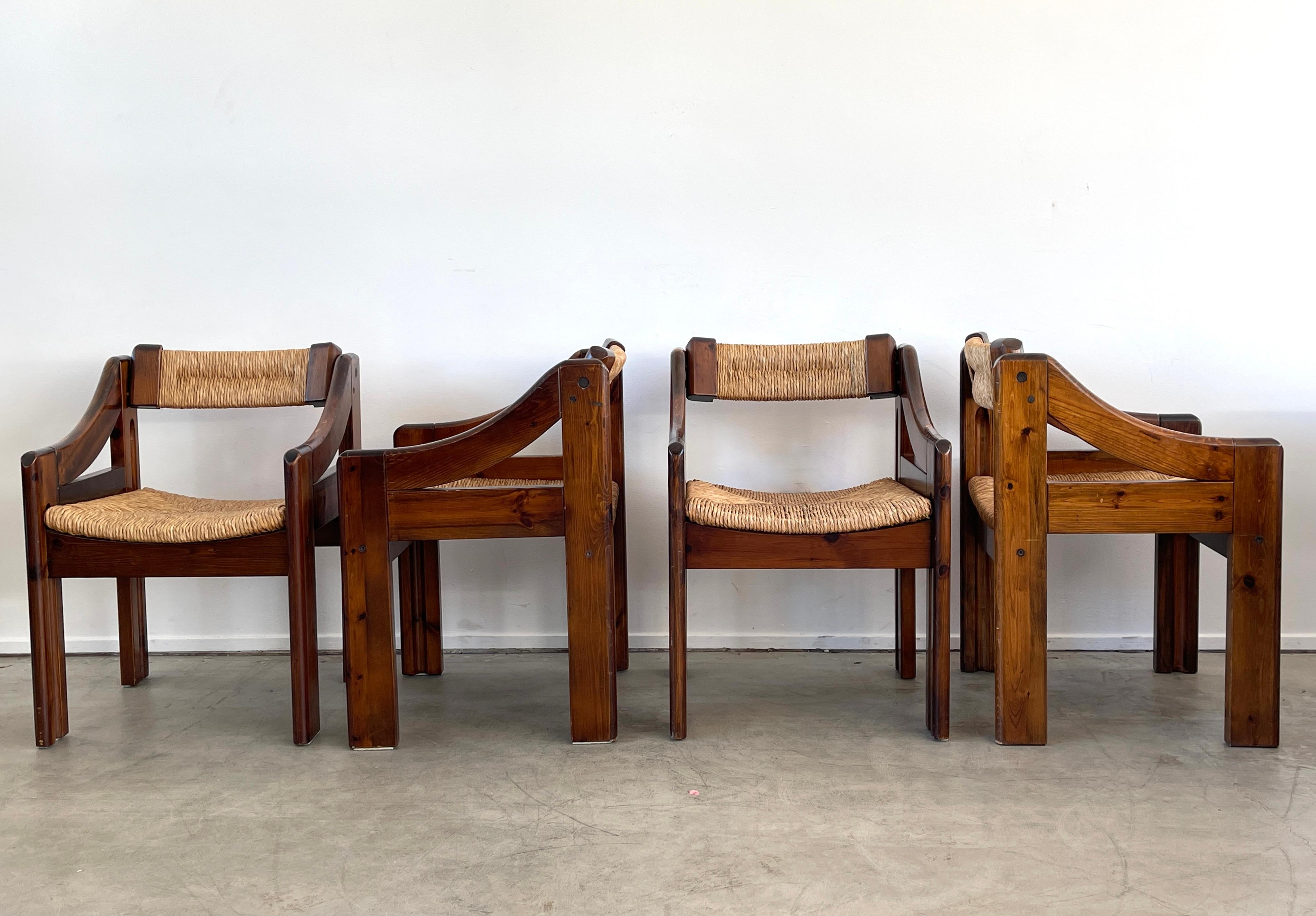 Set of 4 armchairs by Silvio Coppola for Frattelli Montina 
Italy, circa 1970's
Pine wood with wonderful patina 
Woven straw back and seat.