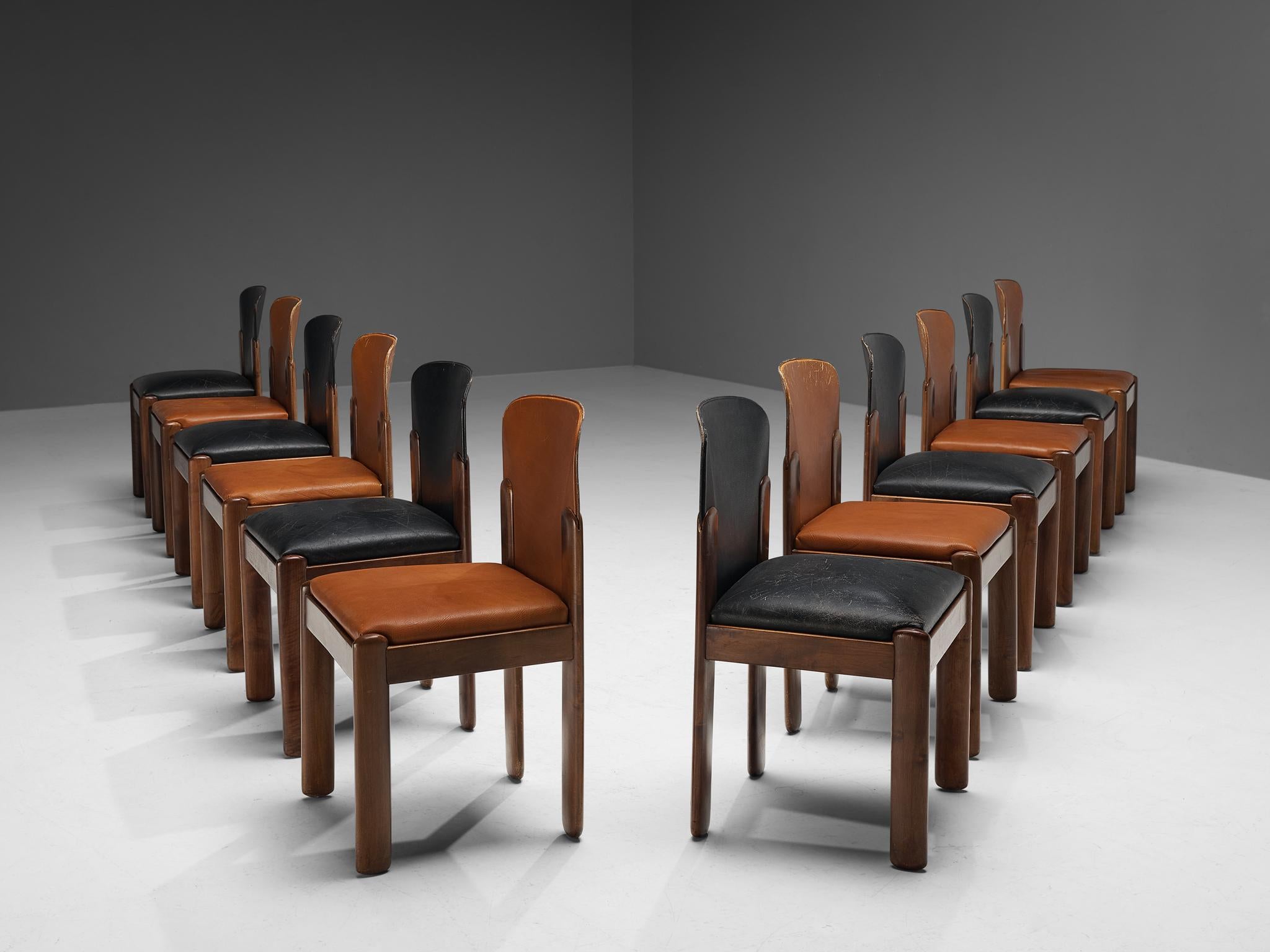 Silvio Coppola for Bernini, twelve dining chairs, model '330', black and cognac leather, stained walnut, Italy, 1960s.

Wonderful bicolor set of twelve dining chairs by Italian designer Silvio Coppola. These aesthetically well balanced chairs