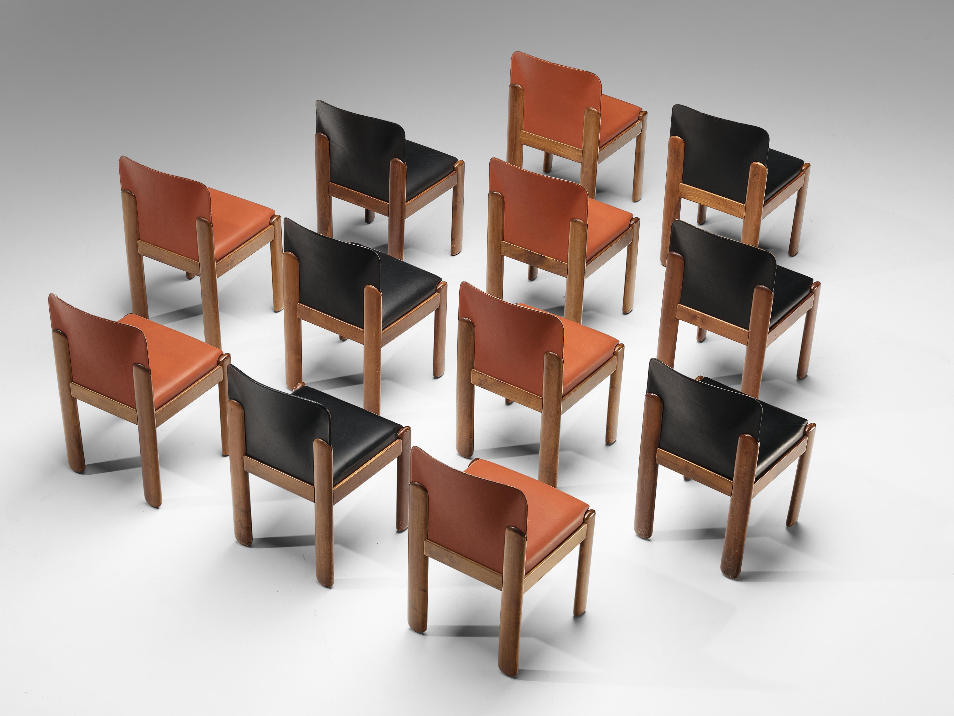 Silvio Coppola for Bernini, 12 dining chairs model 330, red and black leather, stained beech, Italy, 1960s

Wonderful set of 12 dining chairs by Italian designer Silvio Coppola. These aesthetically well balanced chairs strongly convince with the
