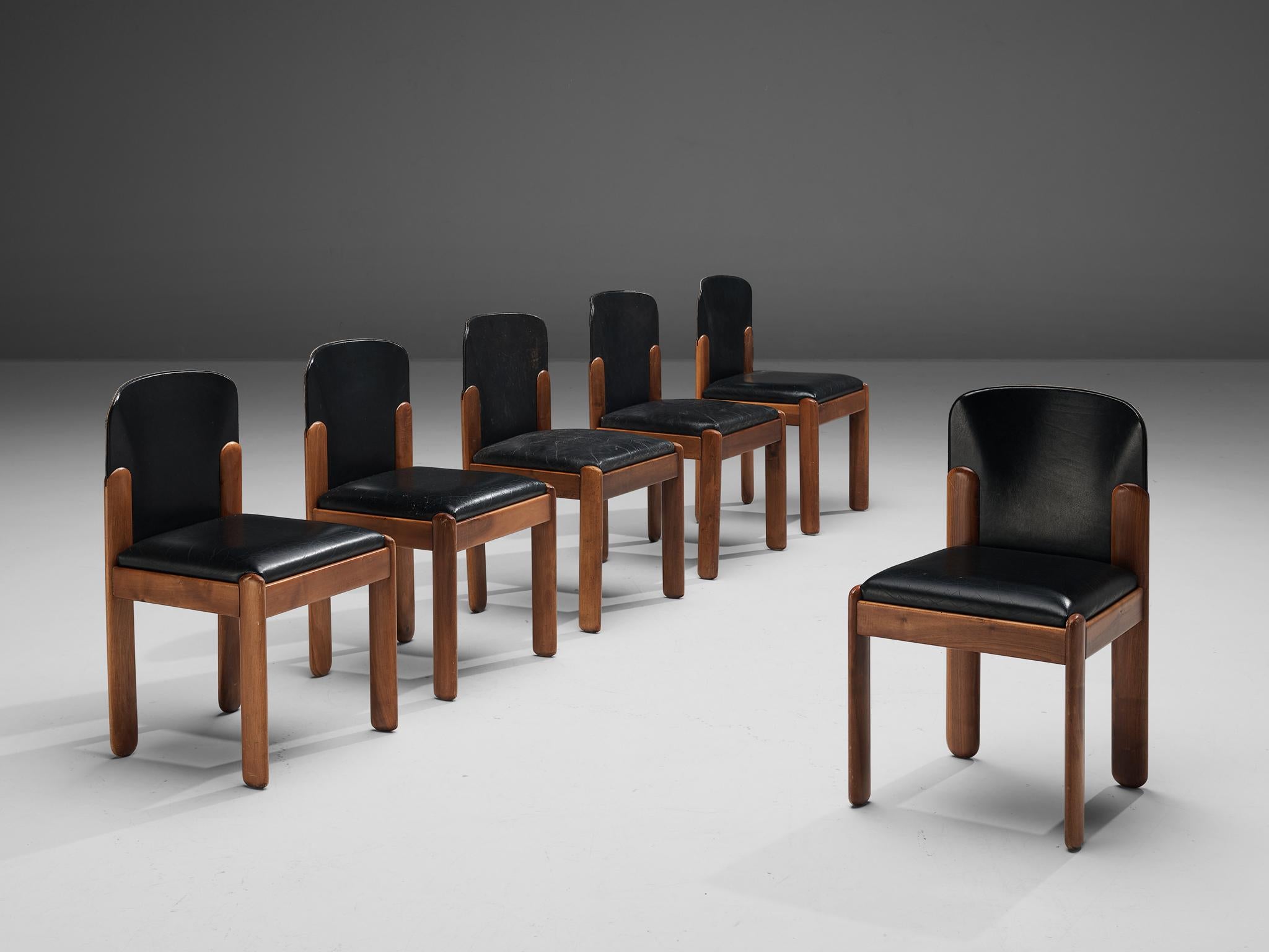 Silvio Coppola for Bernini, six dining chairs model 330, black leather, walnut, Italy, 1960s

Wonderful set of six dining chairs by Italian designer Silvio Coppola. These aesthetically well balanced chairs strongly convince with the contrast
