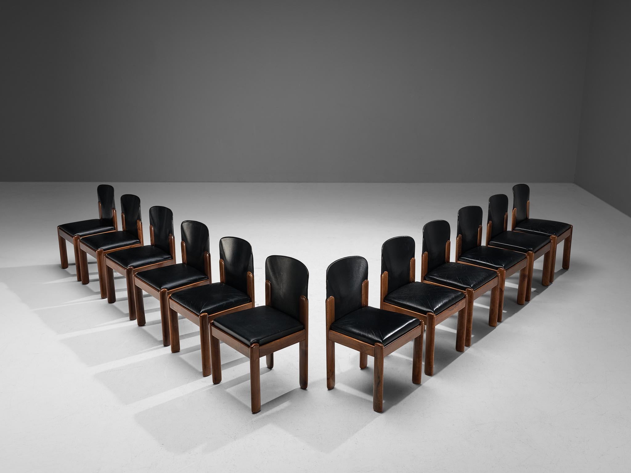 Silvio Coppola for Bernini, set of twelve dining chairs, model 330, leather, stained beech, Italy, 1960s

Wonderful set of ten dining chairs by Italian designer Silvio Coppola. These aesthetically well-balanced chairs strongly convince with the