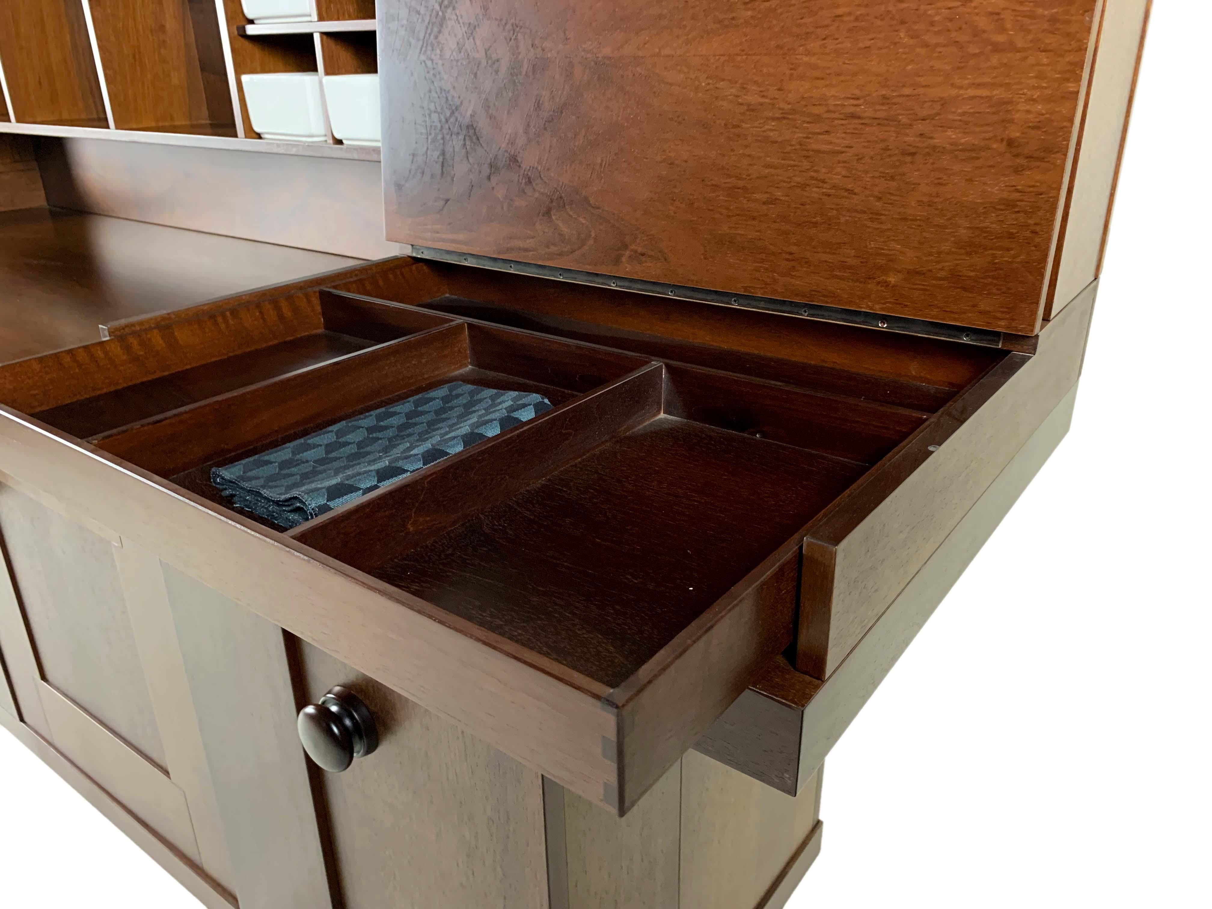 Pranzo is a sideboard clearly inspired by the Lombard cabinetmaking tradition, crafted in walnut wood, in which the essential approach to design typical of Silvio Coppola is evident. It features a design free from ephemeral stylistic excesses,