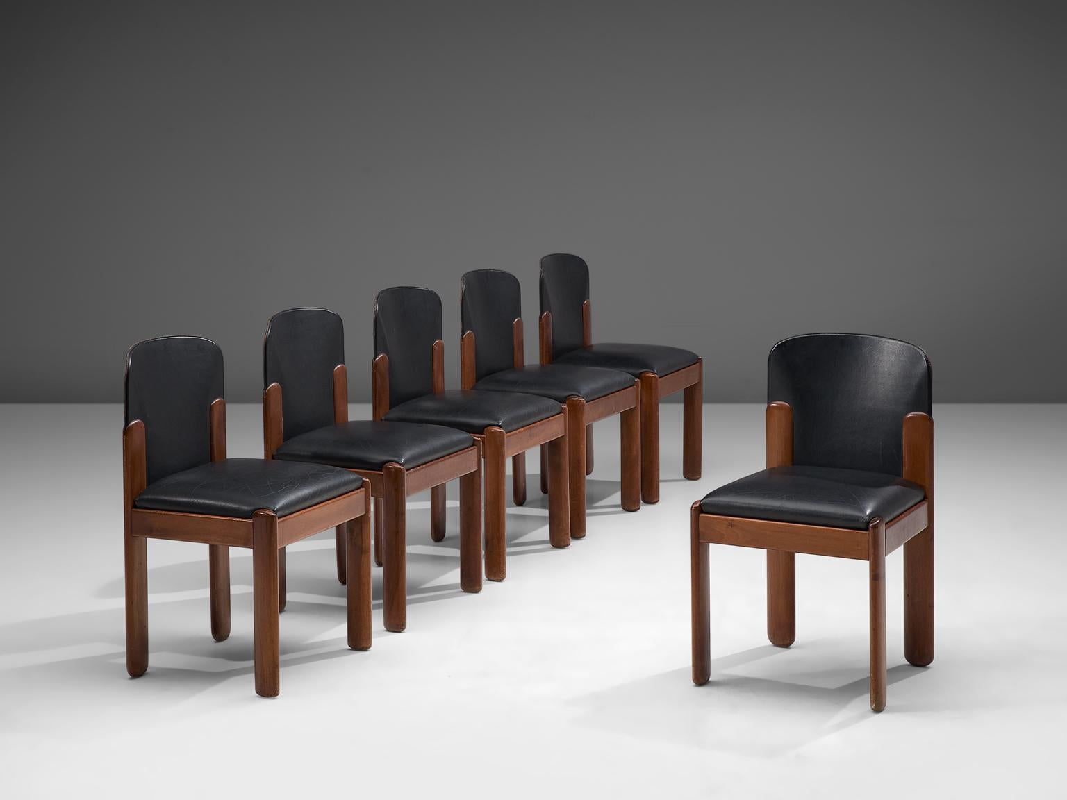 Silvio Coppola For Bernini Italy, set of 6 chairs, black leatherette and stained beech, Italy, 1960s
 
Set of 6 chairs by Italian designer Silvio Coppola. These chairs have a cubic and architectural appearance. The base consist of four straight