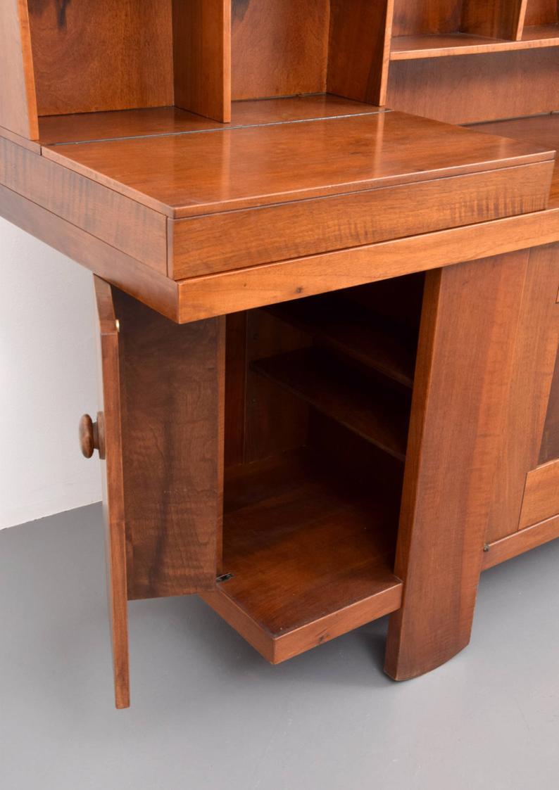 Italy
1965
Veneered wood

About:
Silvio Coppola was born in Brindisi, Italy in 1920 and graduated as architect in Politecnico di Milano. During his professional career he achieved several professional goals, either in Italy and abroad