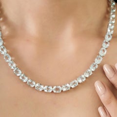 Conjunto de collar y pendientes de plata con aguamarina Silvorra de 100,3 CT, estilo «tenis» de 18 pulgadas