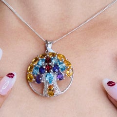 Ciondolo rotondo con albero della vita in pietra naturale multipla di Silvorra da 10,49 carati in argento 925.