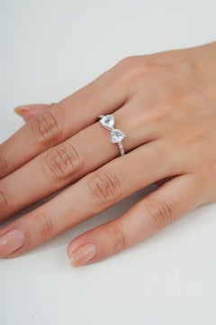 Silvorra 1.21ct Trillion Cut Aquamarine Diamond Bow Ring in 925 Silver
