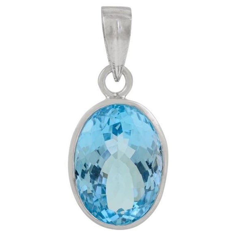 Pendentif rond facetté en topaze bleue et argent rhodié - Odin Minéraux