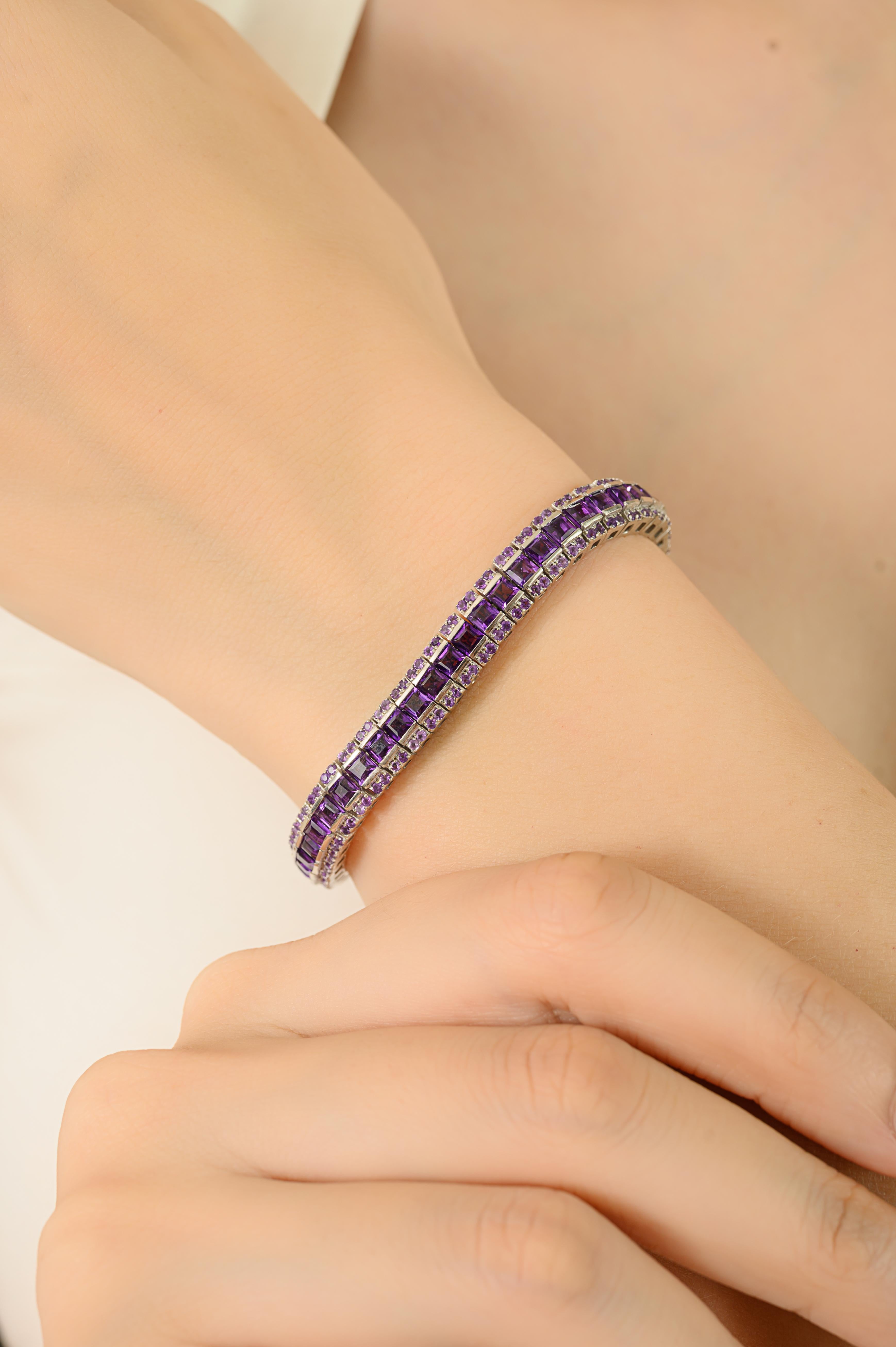 This bracelet is crafted in 925 sterling silver and features natural amethyst gemstones. The amethysts are securely set with a combination of bezel and prong settings, highlighting their rich purple color, in two shapes square and round in sizes of