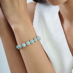 Silvorra 5,1 Karat Cabochon-Türkis-Tennisarmband mit Zirkon-Halo aus 925er Silber