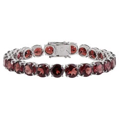 Bracelet « tennis » Silvorra en argent 925 avec sertissage à griffes, orné de grenats rouges d'un poids total de 52,45 carats