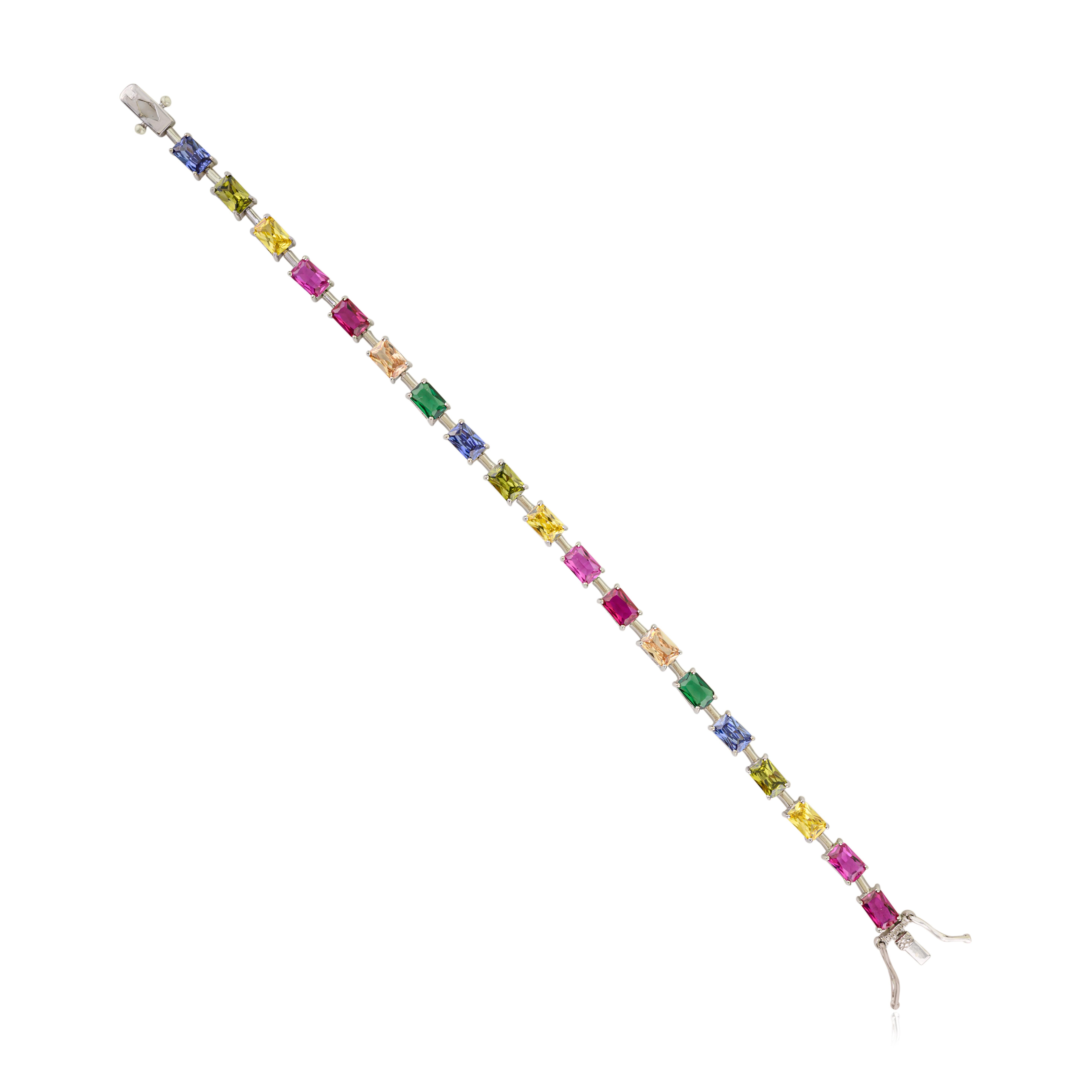 This 925 sterling silver vibrant link bracelet showcases a series of octagon-cut cubic zirconia stones in an array of rainbow hues. Each 6x4 mm stone reflects brilliant color and sparkle, bringing a lively touch to any look. The bracelet measures 7
