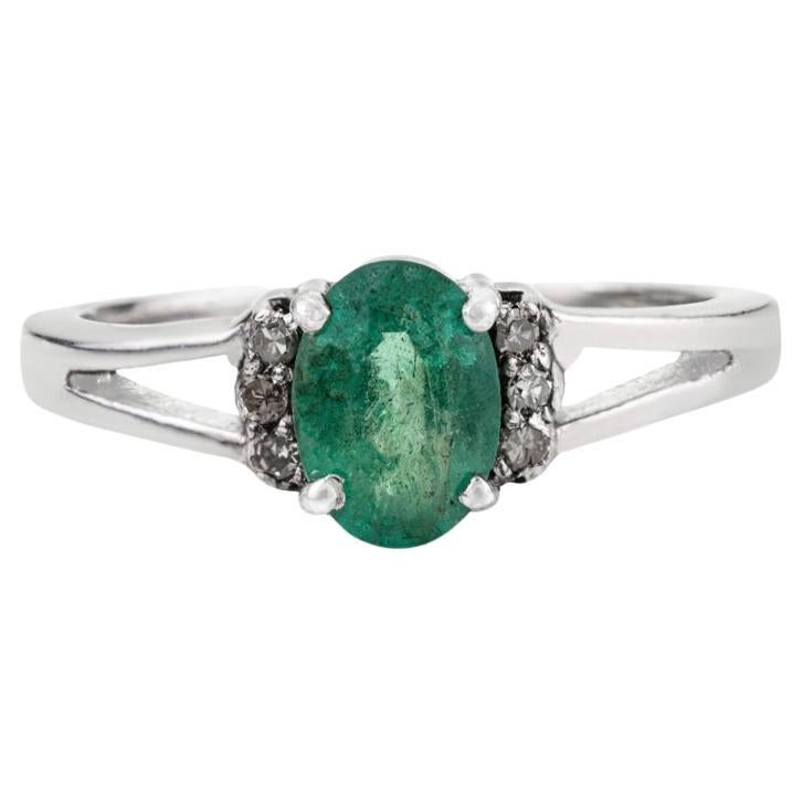 For Sale:  Silvorra 925 Silver Oval Emerald Solitaire Open Split-Shank Ring with Diamonds