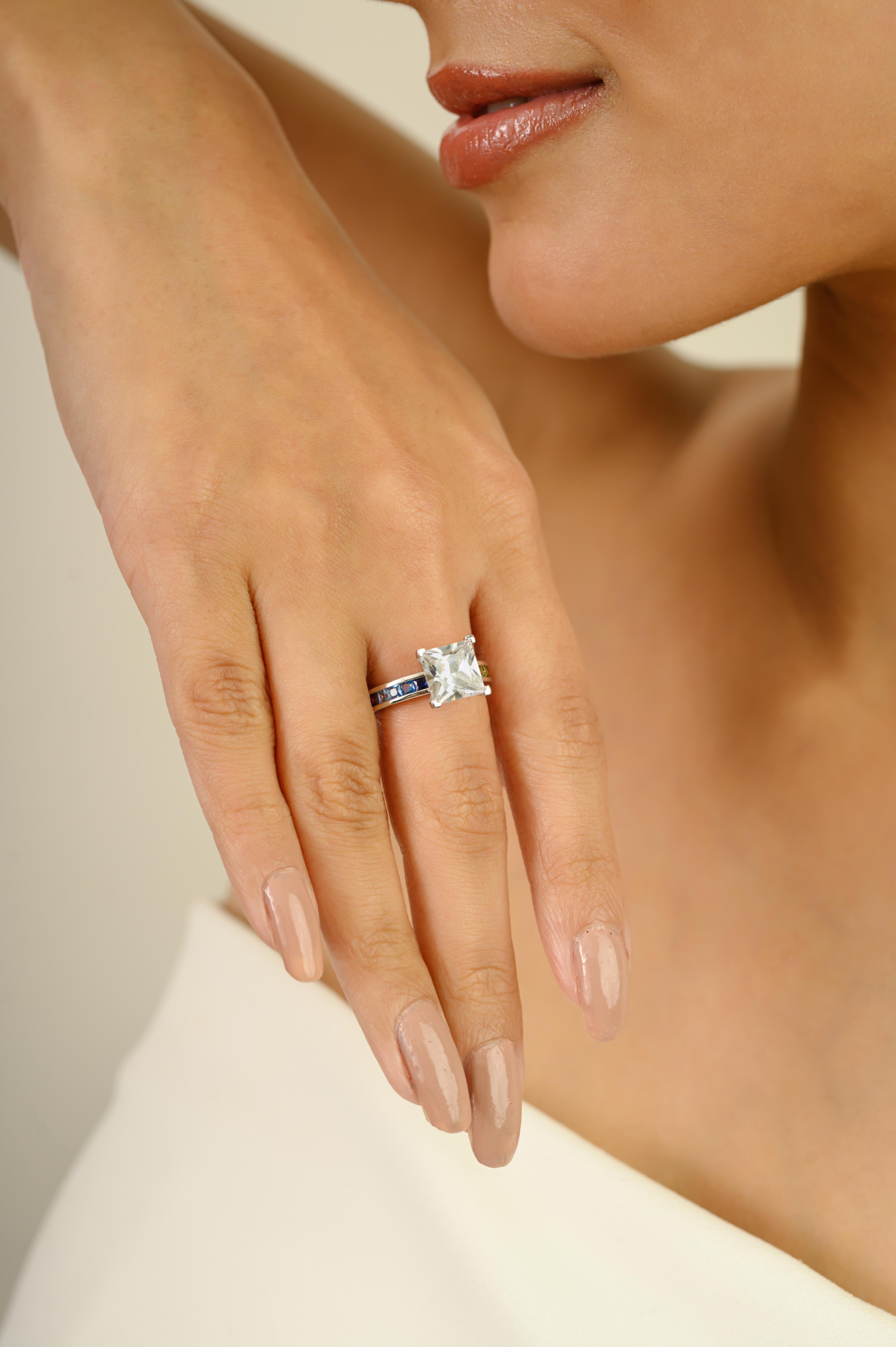 For Sale:  Silvorra 925 Silver Princess Cut Solitaire Ring with Rainbow Cubic Zirconia Band 9