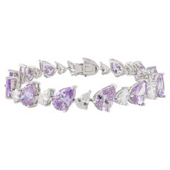 Bracciale tennis in argento 925 con perle e zirconi bianchi e viola di Silvorra