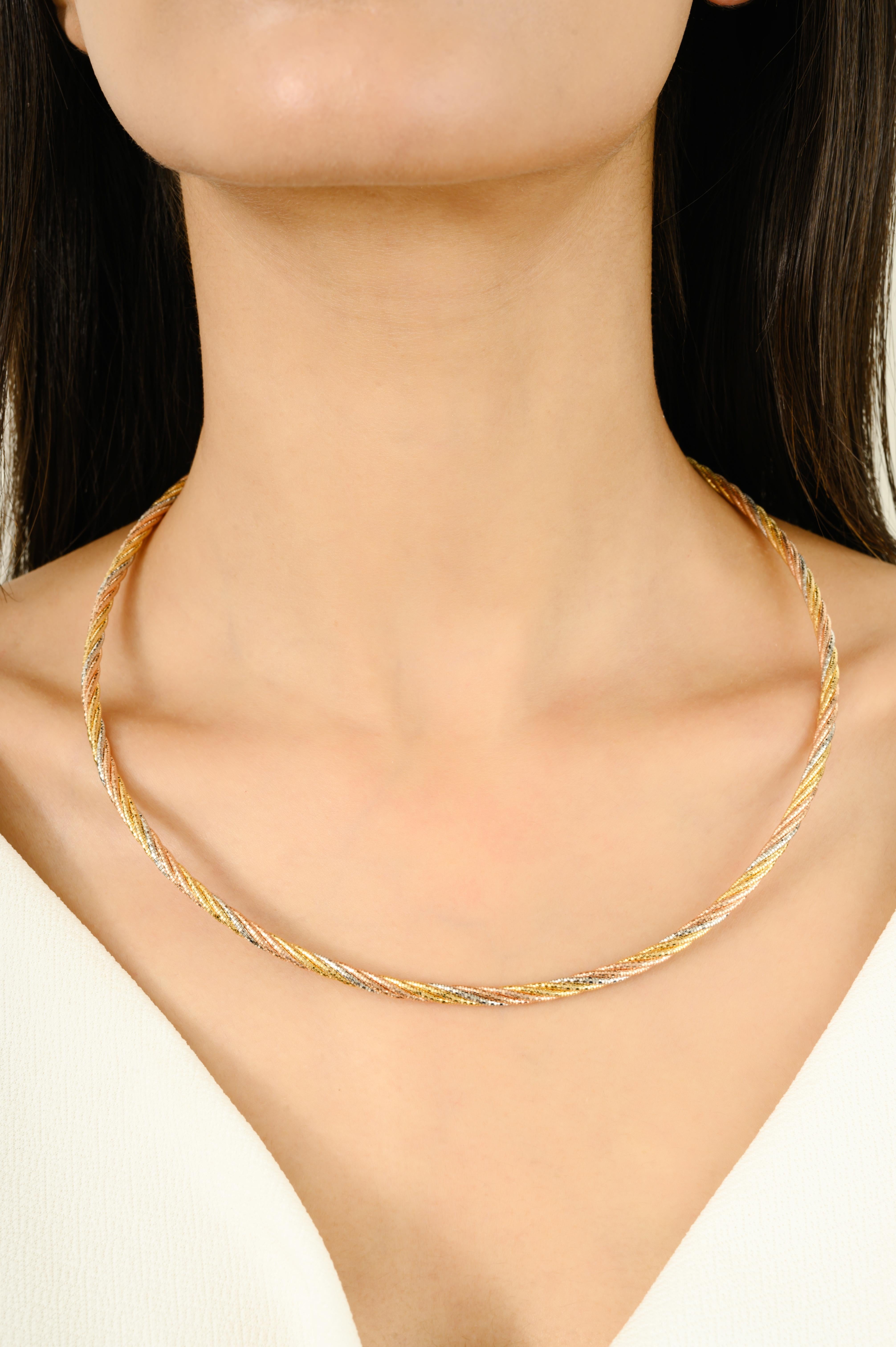 This choker necklace is crafted from solid 925 sterling silver in a twisted rope pattern with a tri-tone finish. Measuring 17.5 inches in length and weighing 24.8 grams, it offers a bold yet refined look. The design balances classic elegance with a