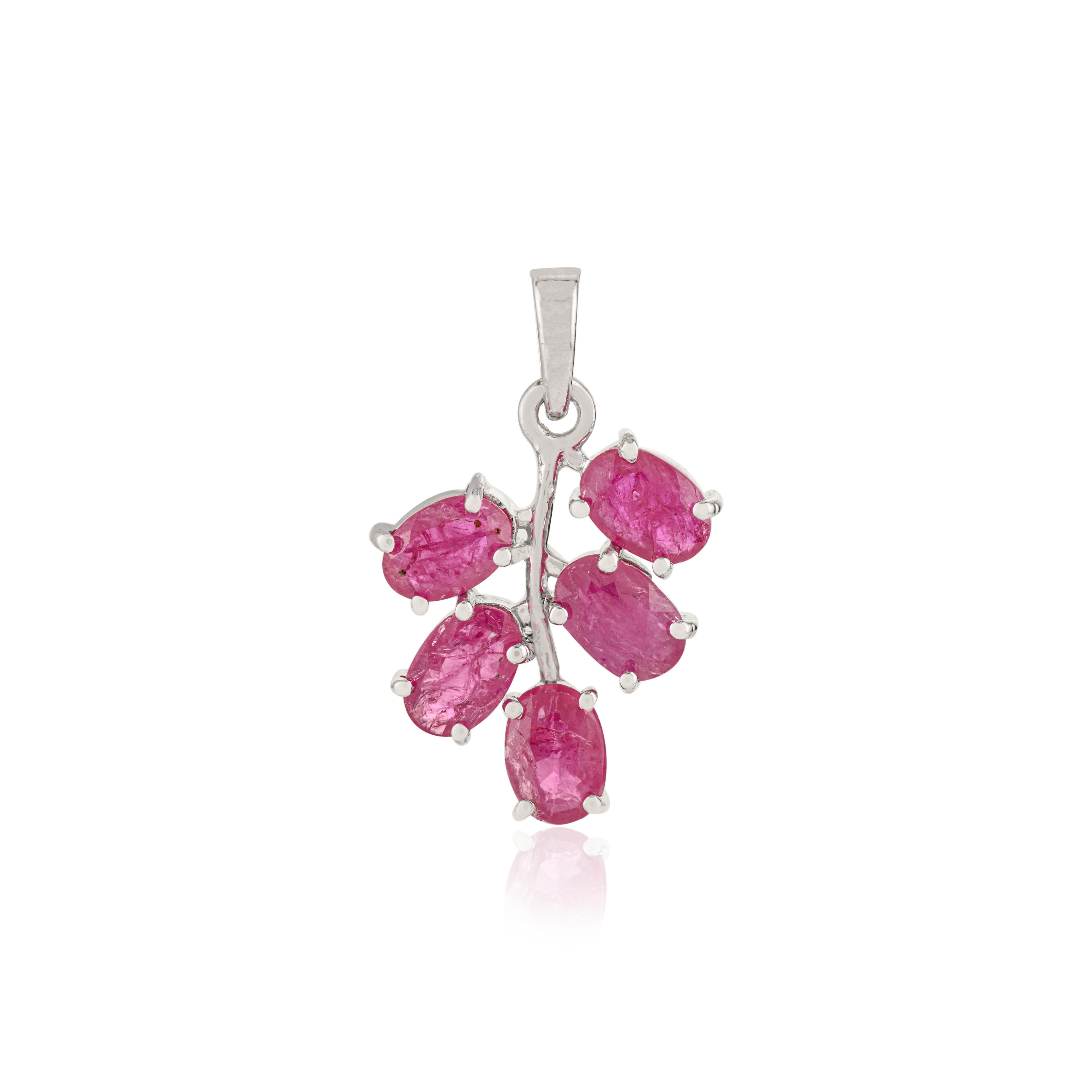 This solid 925 sterling silver pendant from Silvorra features five vivid oval-shaped natural rubies arranged in an elegant leaf cluster design. Each ruby measures approximately 6x4 mm, with a combined carat weight of 2.54 ct, creating a vibrant
