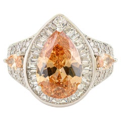 Anello aureola con zirconi bianchi e arancioni a forma di pera in argento Sterling 925 Silvorra