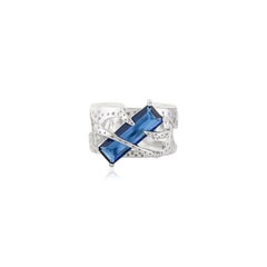 Silvorra 925 Sterling Silver Sculptural Ring with Blue Baguette Cubic Zirconia