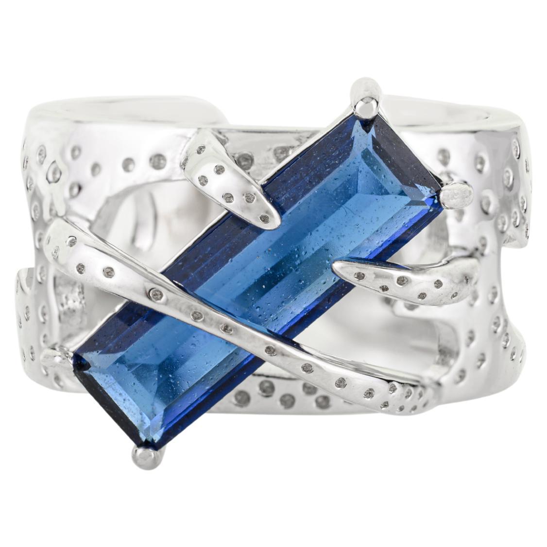 Silvorra 925 Sterling Silver Sculptural Ring with Blue Baguette Cubic Zirconia