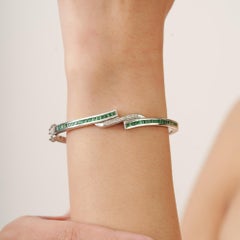 Silvorra Art Deco Silver Emerald and Diamond Crossover Hinged Bangle Bracelet