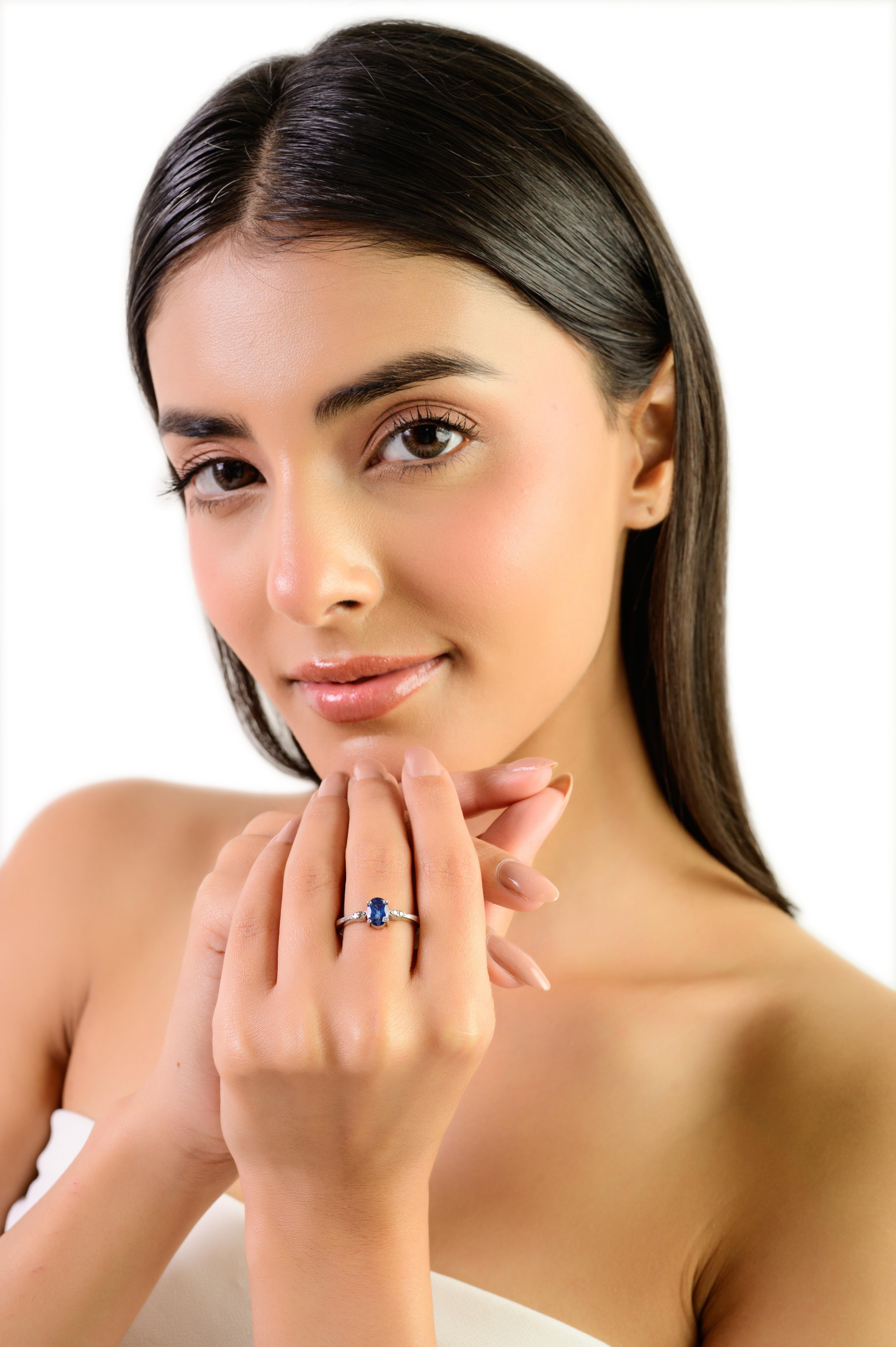 For Sale:  Silvorra Classic Four Prong Oval Cut Blue Sapphire Solitaire Ring with Diamond 4