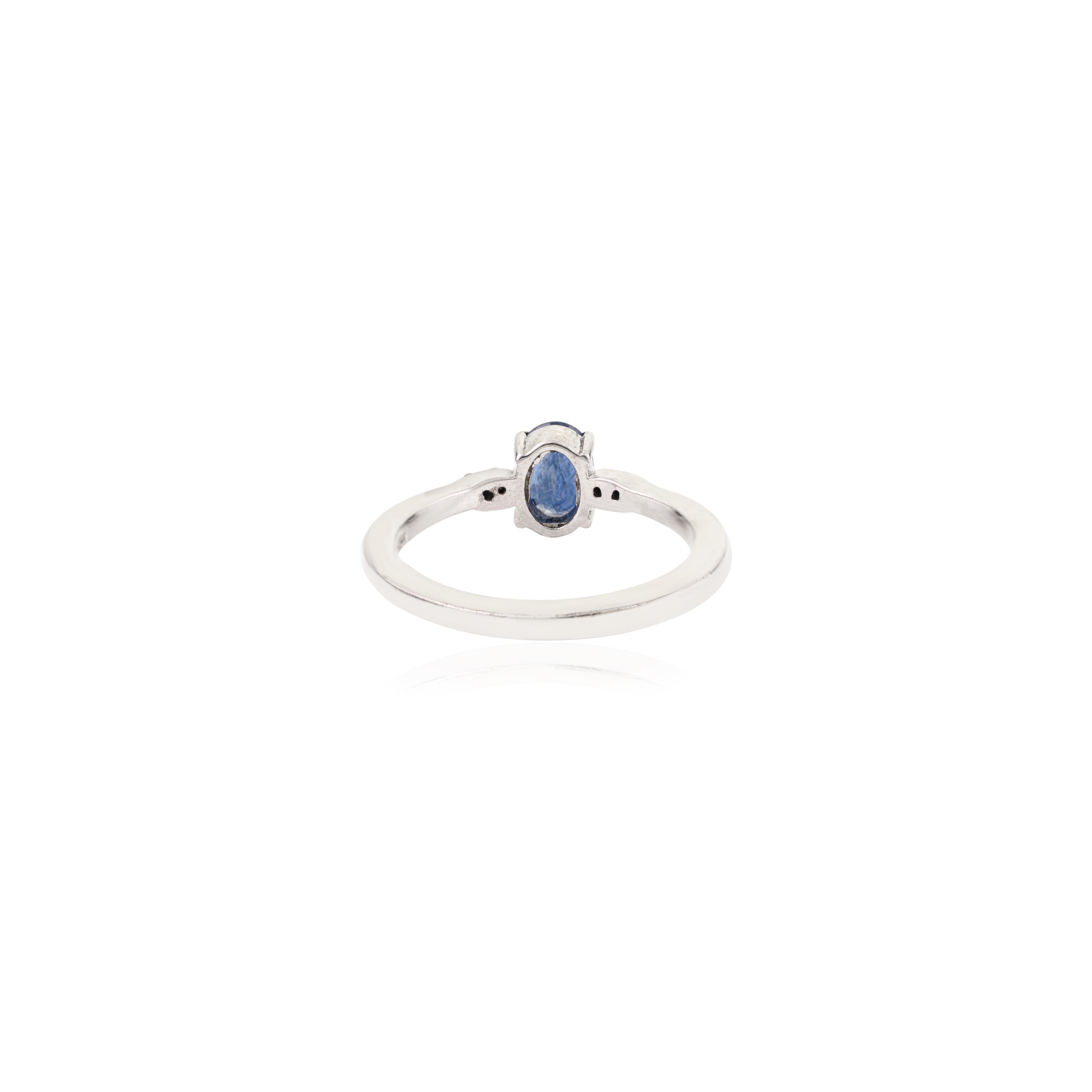 For Sale:  Silvorra Classic Four Prong Oval Cut Blue Sapphire Solitaire Ring with Diamond 9