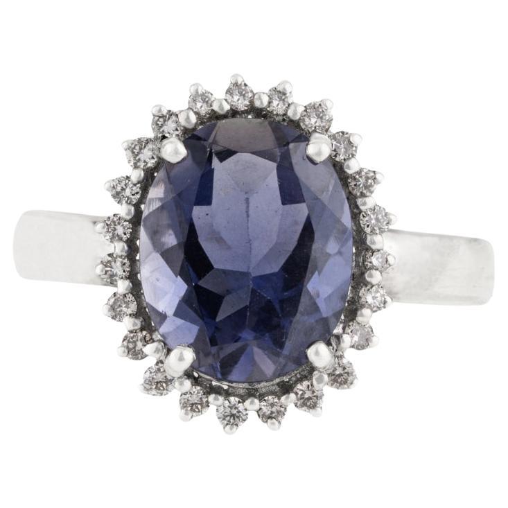 Silvorra Classic Oval Iolite Surround Silver Ring with Halo Diamonds for Gifts
