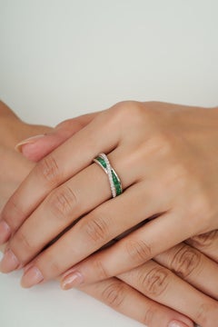 Silvorra Contemporary Emerald and Diamond Crossover Infinity Ring in 925 Silver