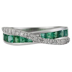 Silvorra Contemporary Emerald and Diamond Crossover Infinity Ring in 925 Silver