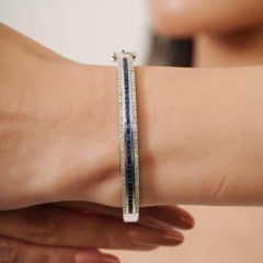 Silvorra Elegant Blue Sapphire Center Line Diamond Accent Silver Bangle Bracelet