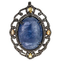 Silvorra Handcrafted Oval Cabochon Tanzanite Yellow Sapphire & Diamond Pendant