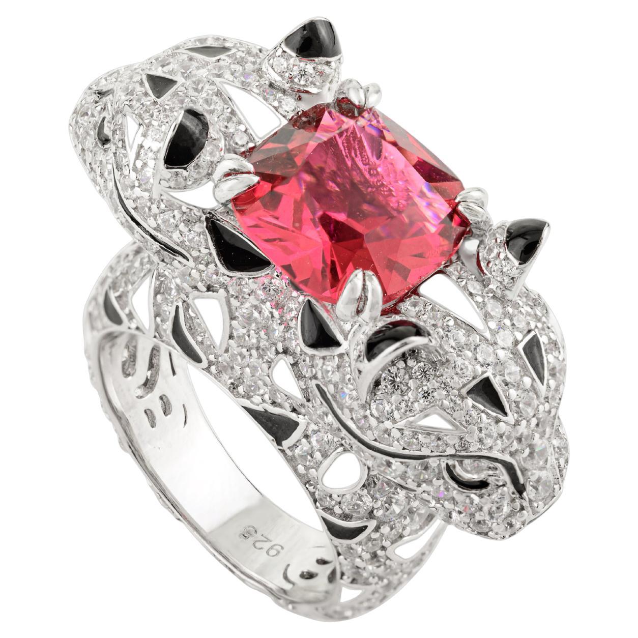 Anello in argento con zircone rosso e bianco, realizzato a mano da Silvorra, con la pantera.