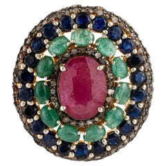 Colgante victoriano de silvorra con diseño de halo en capas de rubí esmeralda y zafiro azul