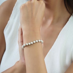 Silvorra Lustrous Natural Round Cut Pearl Tennis Bracelet in 925 Sterling Silver