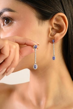 Silvorra Orecchini di lusso in argento con zaffiro blu e diamanti a goccia lineare Regalo per lei