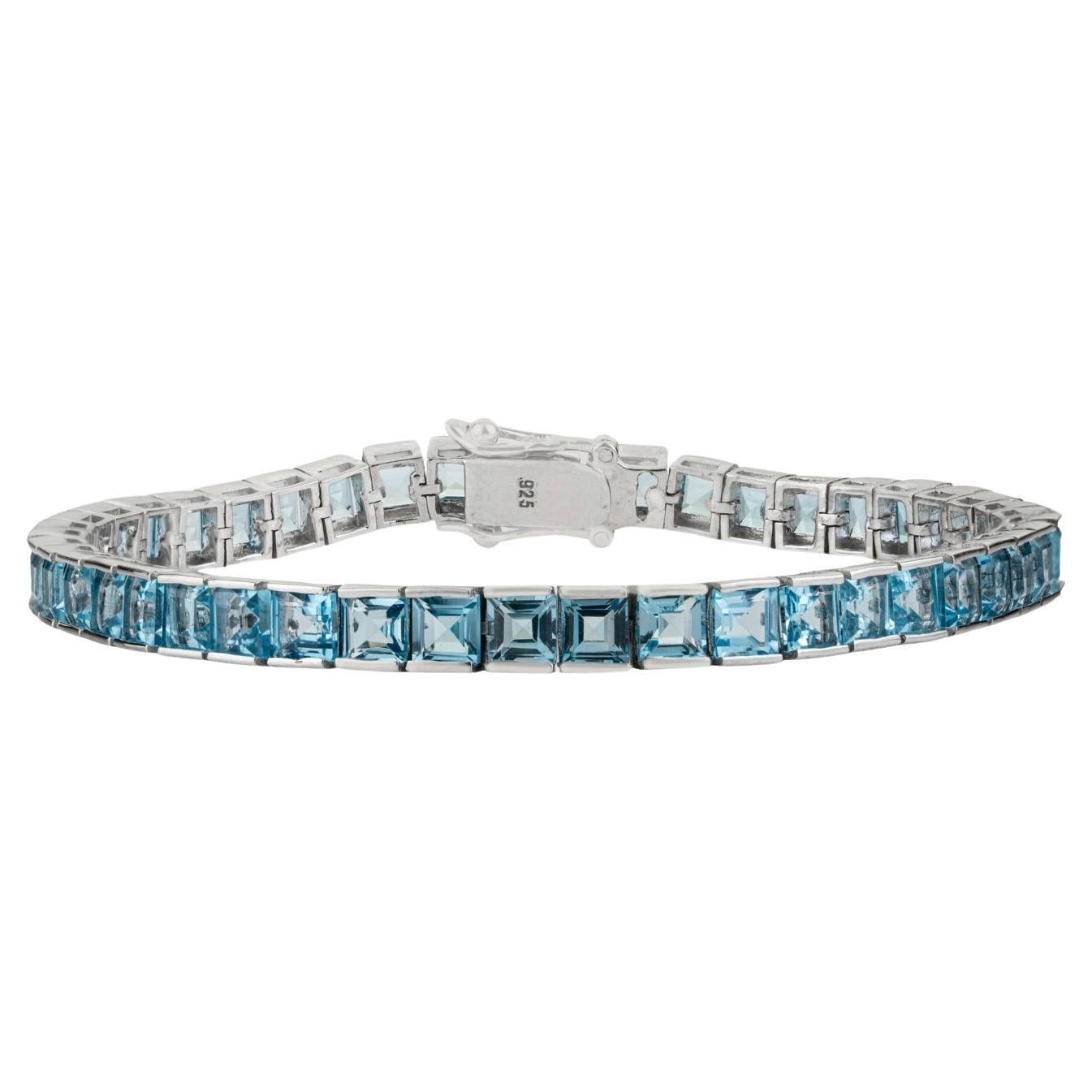 Silvorra Modern 22.35 Carat Blue Topaz Tennis Bracelet in Solid Silver Jewelry