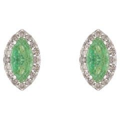 Silvorra Natural Emerald Marquise Silver Stud Earrings in Halo Diamonds for Her Silvorra Natural Emerald Marquise Silver Stud Earrings in Halo Diamonds for Her