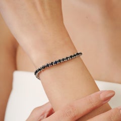 Silvorra Oval Blue Sapphire Continuous Line Bracelet in Solid Silver for Women