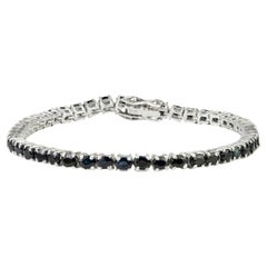 Silvorra Oval Blue Sapphire Continuous Line Bracelet in Solid Silver for Women