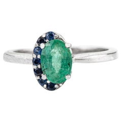 Silvorra Oval-Cut Emerald Promise Ring in Halo Sapphires for Girlfriend Gift