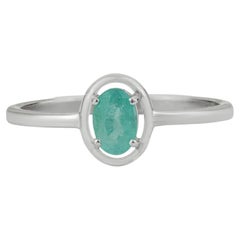 Silvorra Oval Cut Emerald Solitaire Floating Halo Ring in 925 Sterling Silver