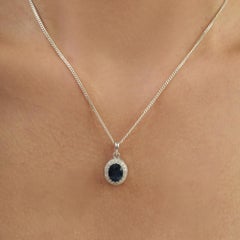 Silvorra Oval Cut Sapphire and Diamond Halo Pendant in 925 Silver Gift for her